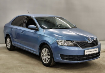 Подержанный автомобиль Skoda Rapid Liftback 2014 года (3 фото)