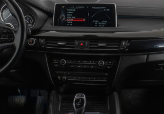 Подержанный автомобиль BMW X6 2015 года (14 фото)