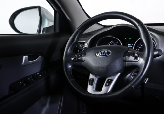 Подержанный автомобиль Kia Sportage 2014 года (13 фото)