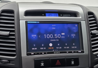 Подержанный автомобиль Hyundai Santa Fe 2010 года (13 фото)