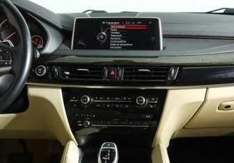 Подержанный автомобиль BMW X6 2015 года (15 фото)