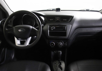Подержанный автомобиль Kia Rio Hatchback 2013 года (7 фото)