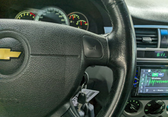 Подержанный автомобиль Chevrolet Lacetti Sedan 2012 года (27 фото)