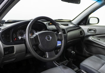 Подержанный автомобиль Nissan Almera Classic 2012 года (10 фото)