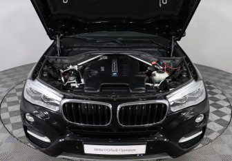 Подержанный автомобиль BMW X6 2017 года (10 фото)