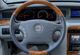 Подержанный автомобиль Kia Opirus 2003 года (15 фото)