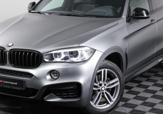 Подержанный автомобиль BMW X6 2018 года (26 фото)