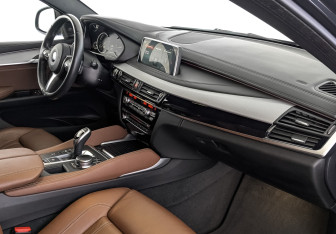 Подержанный автомобиль BMW X6 2018 года (13 фото)