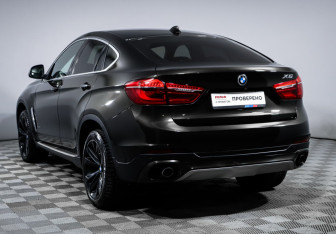 Подержанный автомобиль BMW X6 2016 года (7 фото)