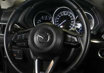 Подержанный автомобиль Mazda CX-5 2022 года (10 фото)