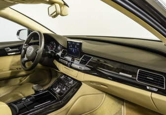 Подержанный автомобиль Audi A8 2014 года (9 фото)