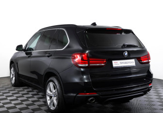 Подержанный автомобиль BMW X5 2014 года (7 фото)