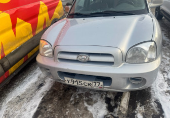 Подержанный автомобиль Hyundai Santa Fe 2011 года (3 фото)