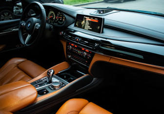 Подержанный автомобиль BMW X6 M 2016 года (11 фото)