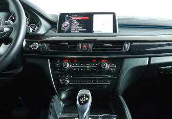 Подержанный автомобиль BMW X6 2014 года (14 фото)