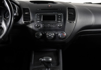 Подержанный автомобиль Kia Cerato Sedan 2013 года (12 фото)