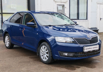 Подержанный автомобиль Skoda Rapid Liftback 2014 года (3 фото)