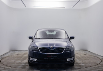 Подержанный автомобиль Skoda Rapid Liftback 2014 года (2 фото)