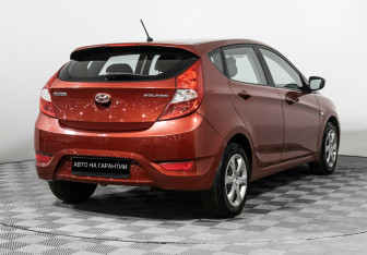 Подержанный автомобиль Hyundai Solaris Hatchback 2012 года (3 фото)