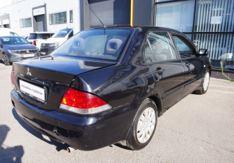Подержанный автомобиль Mitsubishi Lancer Sedan 2006 года (5 фото)