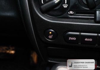 Подержанный автомобиль Suzuki Jimny 2007 года (16 фото)