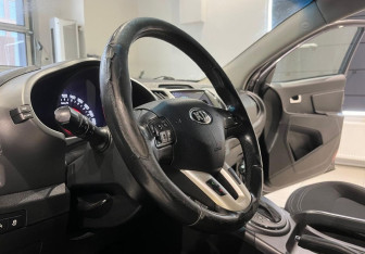 Подержанный автомобиль Kia Sportage 2013 года (10 фото)