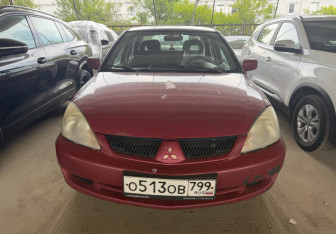 Подержанный автомобиль Mitsubishi Lancer Sedan 2007 года (12 фото)