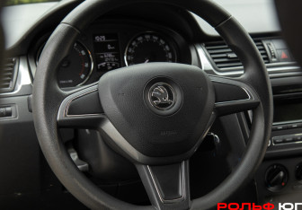 Подержанный автомобиль Skoda Rapid Liftback 2014 года (11 фото)