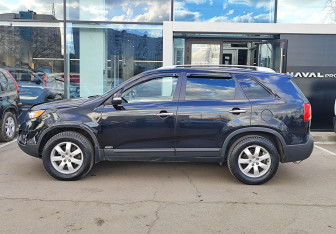 Подержанный автомобиль Kia Sorento 2011 года (8 фото)
