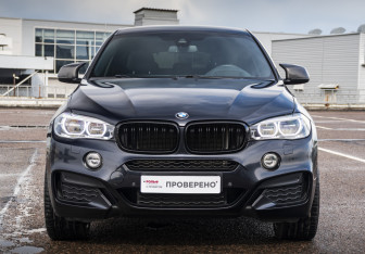 Подержанный автомобиль BMW X6 2018 года (2 фото)
