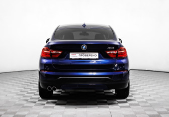 Подержанный автомобиль BMW X4 2015 года (6 фото)