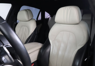Подержанный автомобиль BMW X6 2015 года (17 фото)