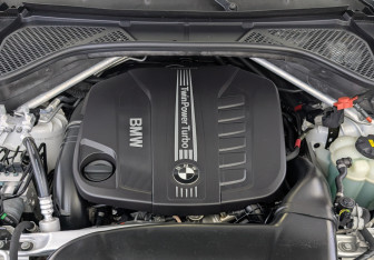 Подержанный автомобиль BMW X6 2018 года (9 фото)