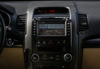 Подержанный автомобиль Kia Sorento 2011 года (10 фото)