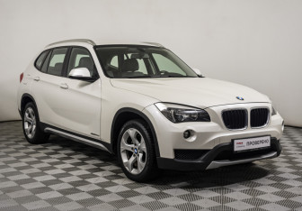 Подержанный автомобиль BMW X1 2014 года (3 фото)