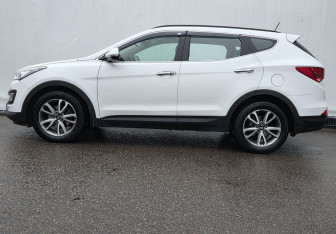 Подержанный автомобиль Hyundai Santa Fe 2014 года (8 фото)