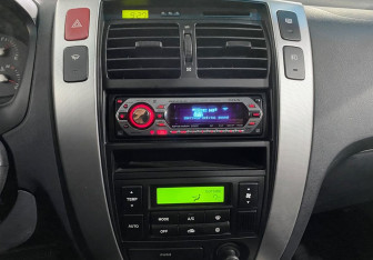 Подержанный автомобиль Hyundai Tucson 2006 года (13 фото)