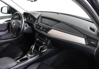 Подержанный автомобиль BMW X1 2014 года (11 фото)