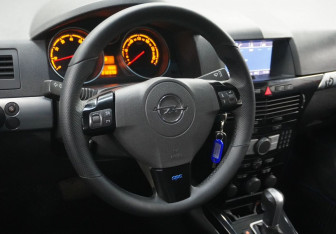 Подержанный автомобиль Opel Astra Hatchback 2010 года (12 фото)