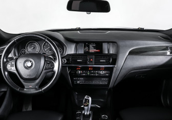 Подержанный автомобиль BMW X4 2016 года (17 фото)