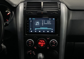 Подержанный автомобиль Suzuki Grand Vitara 2011 года (12 фото)