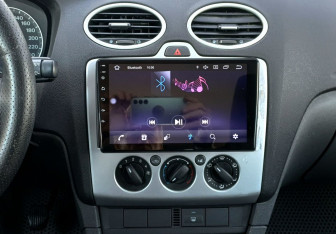 Подержанный автомобиль Ford Focus Wagon 2005 года (13 фото)