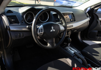 Подержанный автомобиль Mitsubishi Lancer Sedan 2014 года (12 фото)
