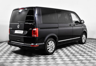Подержанный автомобиль Volkswagen Multivan 2016 года (5 фото)