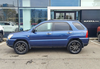 Подержанный автомобиль Kia Sportage 2009 года (8 фото)
