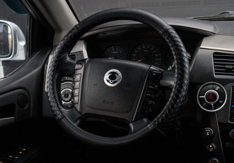 Подержанный автомобиль SsangYong Kyron 2010 года (13 фото)