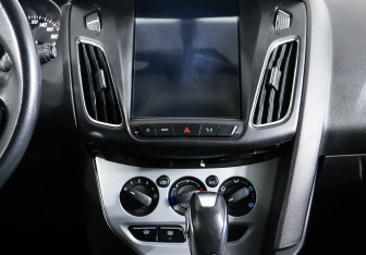 Подержанный автомобиль Ford Focus Wagon 2014 года (12 фото)