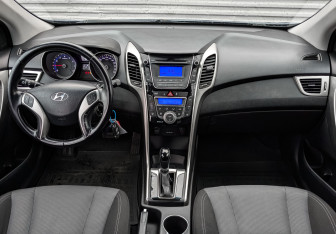 Подержанный автомобиль Hyundai i30 Hatchback 2014 года (14 фото)