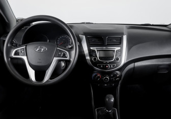 Подержанный автомобиль Hyundai Solaris Hatchback 2013 года (12 фото)