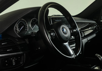 Подержанный автомобиль BMW X6 2016 года (11 фото)